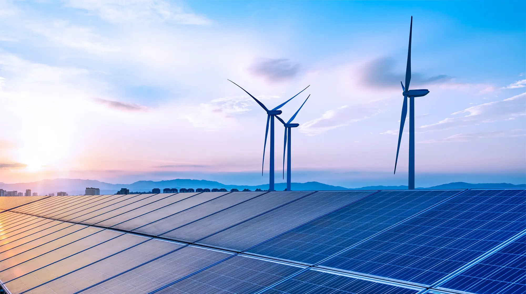 Image of a solar panel field and wind turbines - Hero Image